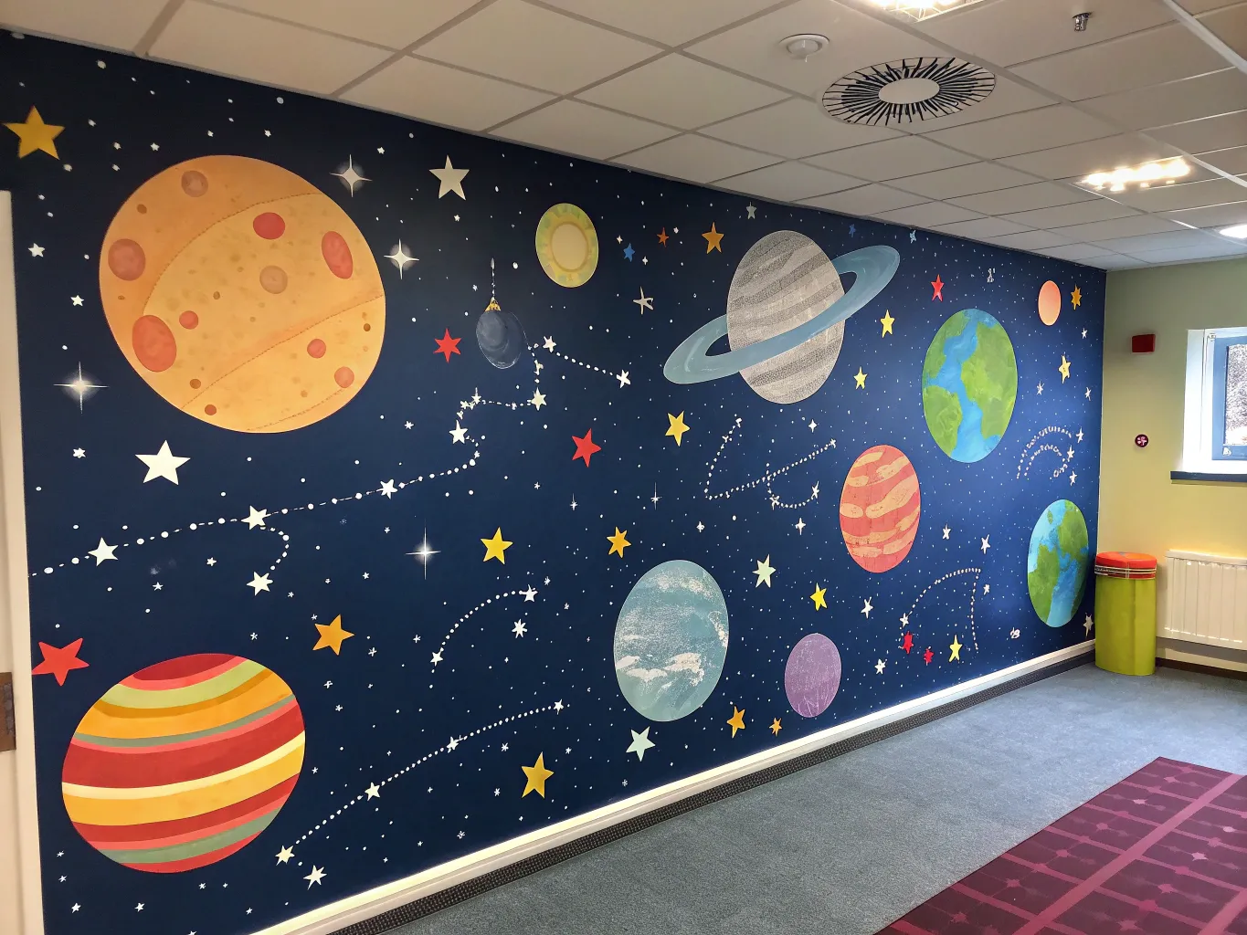 Space-themed mural for children's playroom with planets and stars